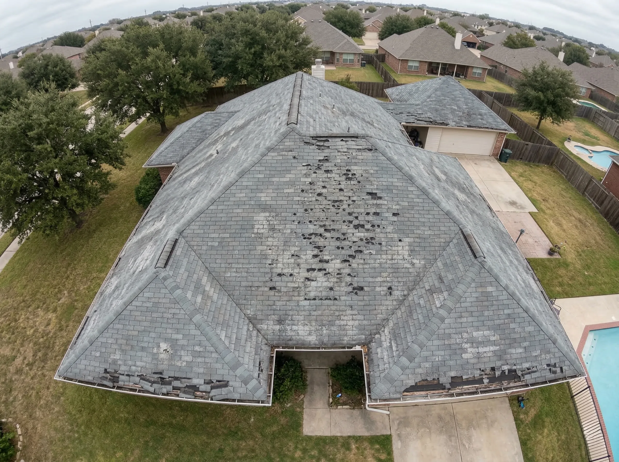 Aerial view of roof before storm restoration